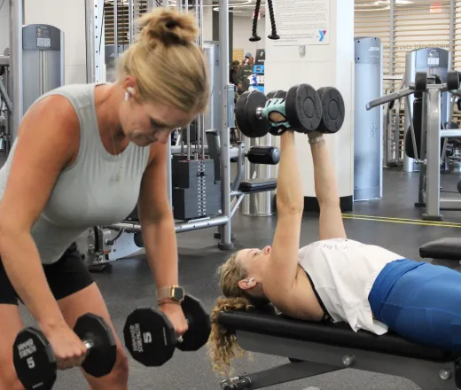 girls lifting weights